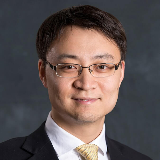 Headshot of Mike Yan, Principal at SLCG Economic Consulting