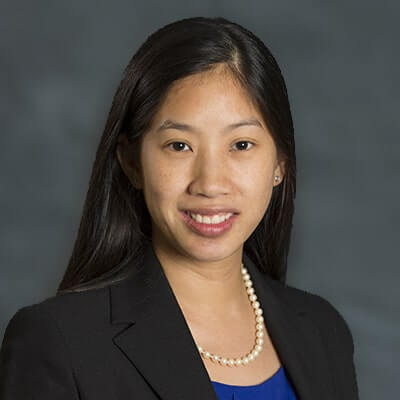 Headshot of Sandy Ouano, Senior Manager at SLCG Economic Consulting