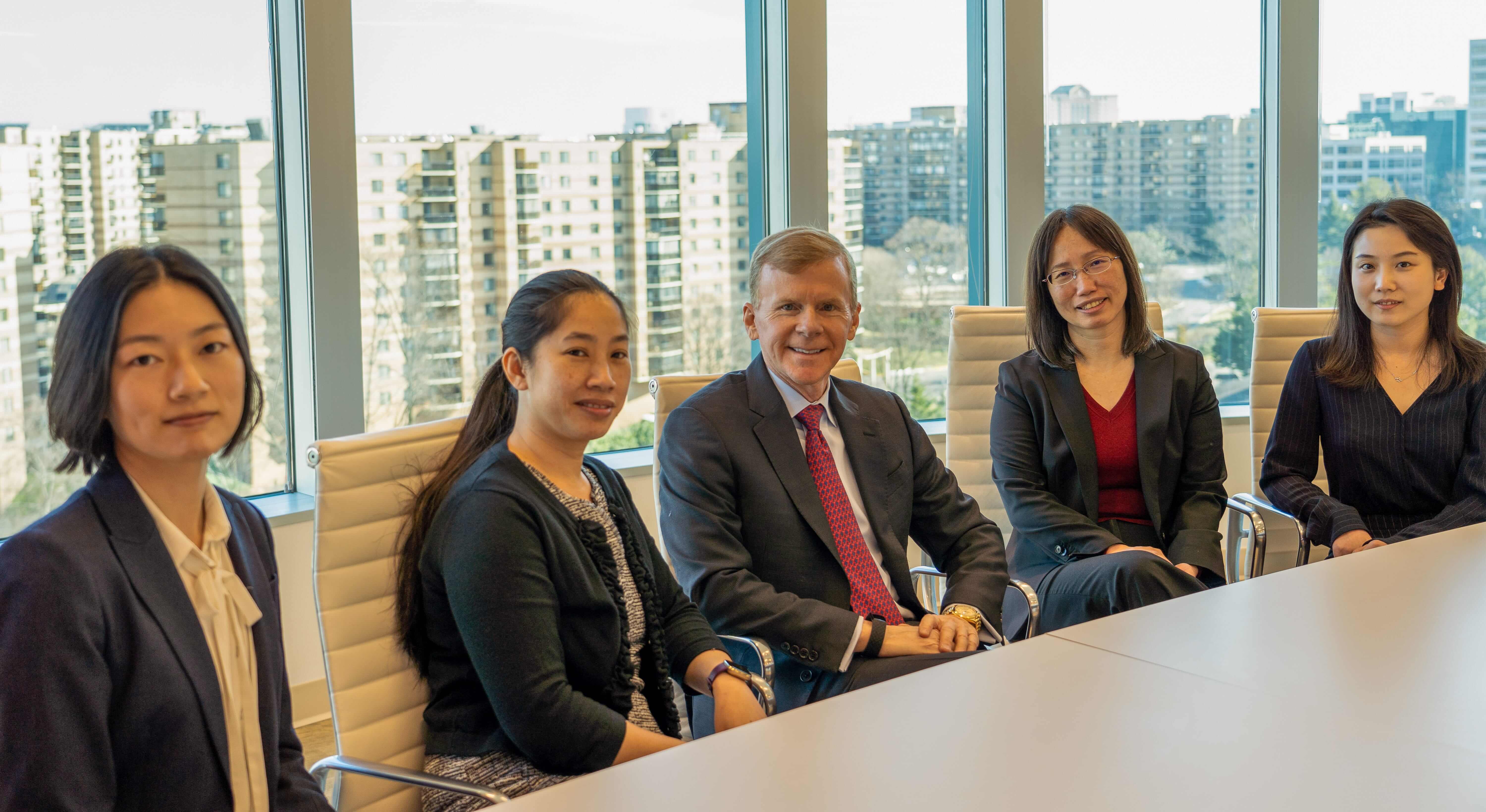 A group photo of SLCG Economic Consulting founder, Craig McCann, and all of the Senior Managers.